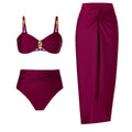 Two‑piece bikini top bottom with matching wrap skirt vacation set